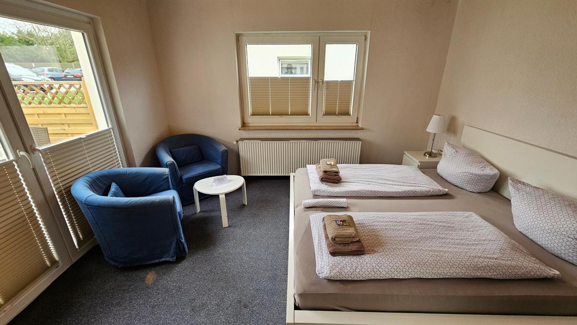 Hotel Dorfkrug Büsum - günstige Altbauzimmer Am Oland Zimmer foto